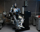 RoboCop: 7" Scale Action Figure -  Ultimate Battle Damaged RoboCop with Chair
